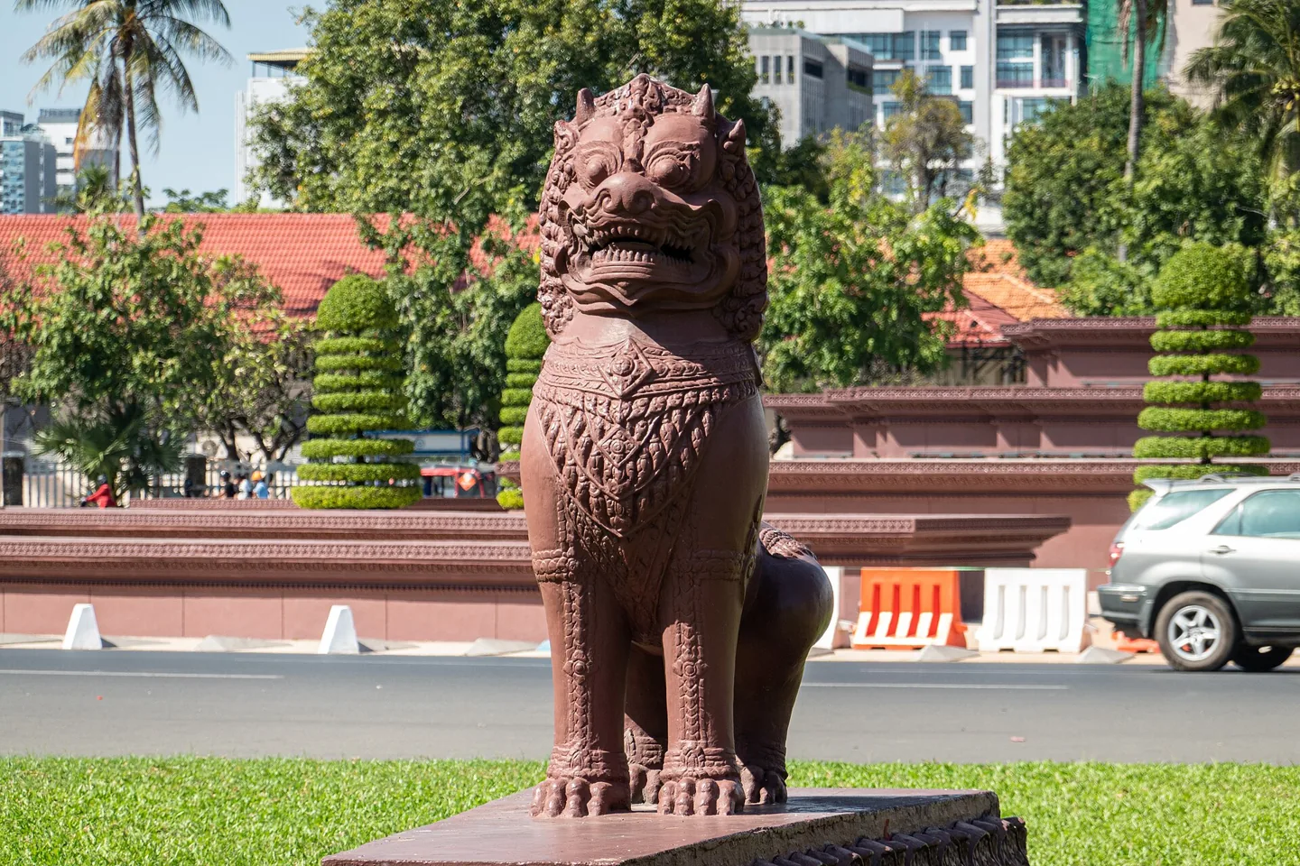 Stone lion beside Independence Monument