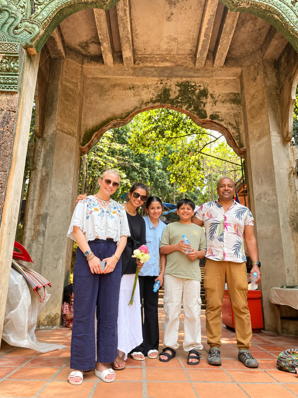 Travelers gathered at a temple entrance